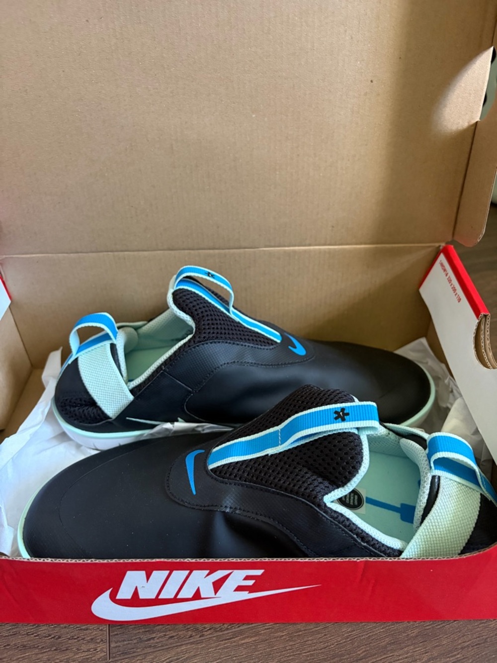 Nike Black Slip-On Kids Sneakers with Blue Accents